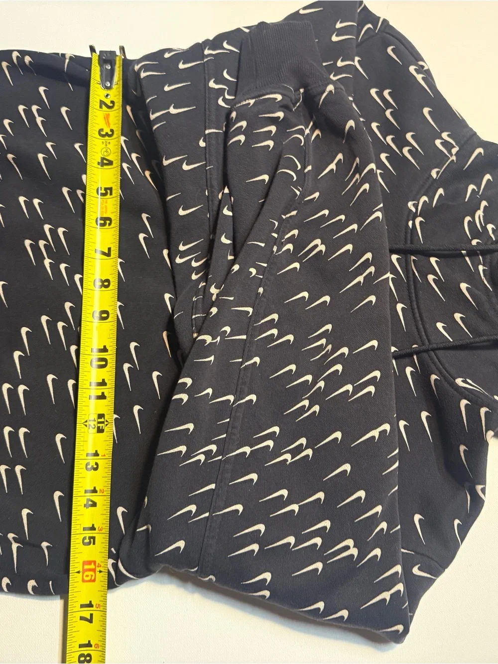 Nike‎ Black Hoodie with Repeating White Swoosh Print